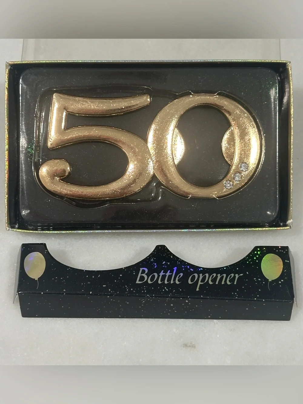50th Celebration Gold Bottle Opener giveaway to guests